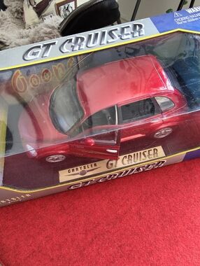 Gate 1/18 Scale Diecast 2001 Chrysler PT Cruiser GT model car in red.